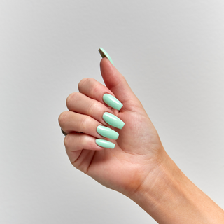 en Vogue Lac it! Off the clock cool-toned pastel lime-green crème UV/LED gel nail polish for professional nails and extensions. Shown on nails