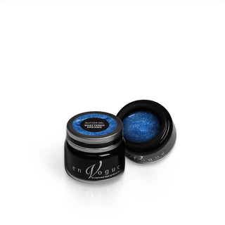 en Vogue shattered-dreams jelly blue base with circular iridescent glitter gel polish for professional nails and extensions shown in container
