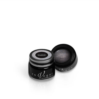 en Vogue stardust with fine iridescent glitter gel polish for professional nails and extensions shown in container