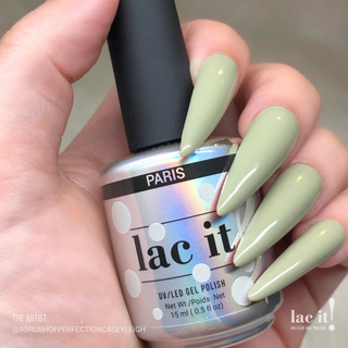 en Vogue Lac It! Paris dusty sage crème UV/LED gel nail polish for professional nails and extensions on lomng stiletto nails holiding polish bottle